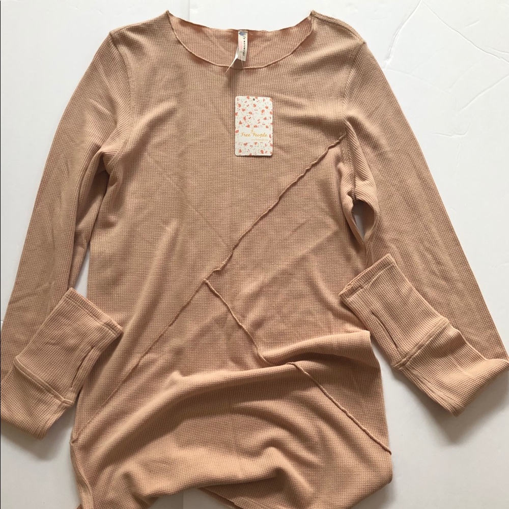 Free people light pink or blush top